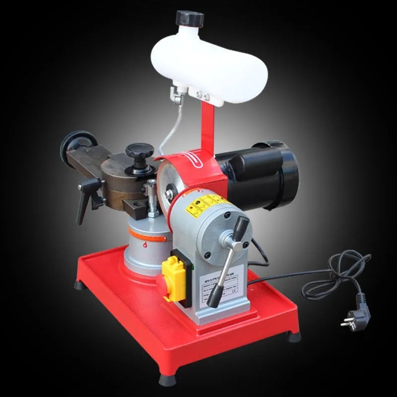 Small manual sharpedge grinding machine for alloy circular saw blades on a workbench.
