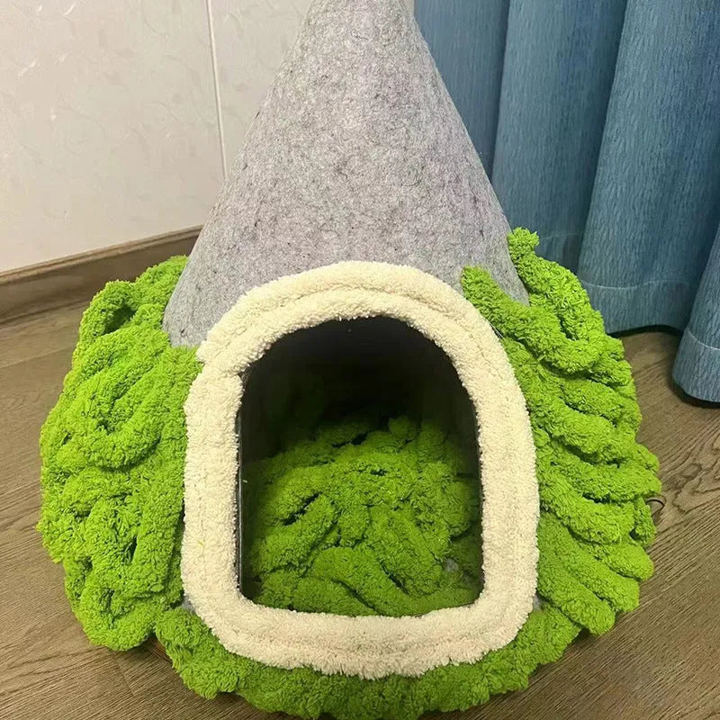 Grey cone-shaped felt cat house with tent-style enclosed design for indoor use