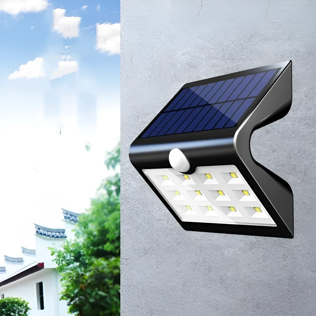 A compact, rectangular solar-powered yard light for outdoor garden or wall mounting.