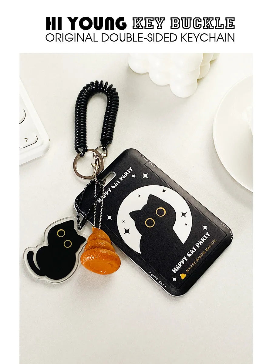 Plastic card holder with little black cat cartoon design and a metal ferrule pendant for attachment.