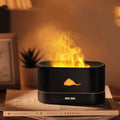Square white flame humidifier with aromatherapy diffuser and colourful simulation flame on a desktop.