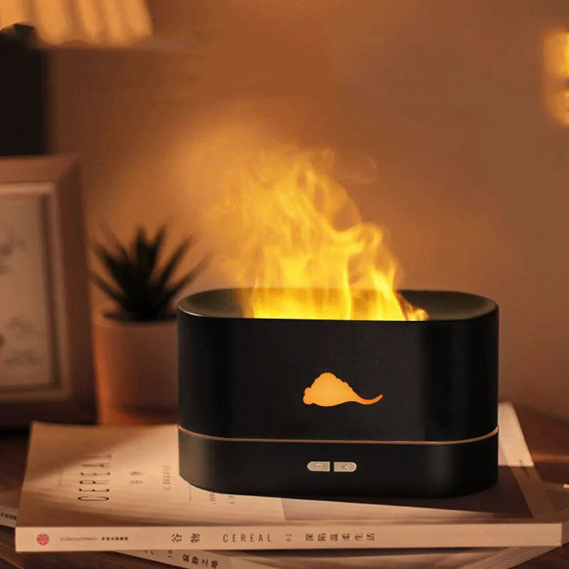 Square white flame humidifier with aromatherapy diffuser and colourful simulation flame on a desktop.