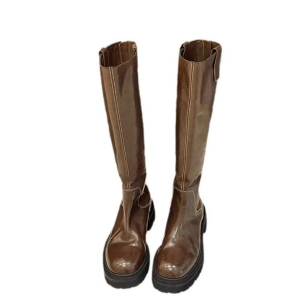 Women's black knee high chunky heel boots with round toe and back zipper.