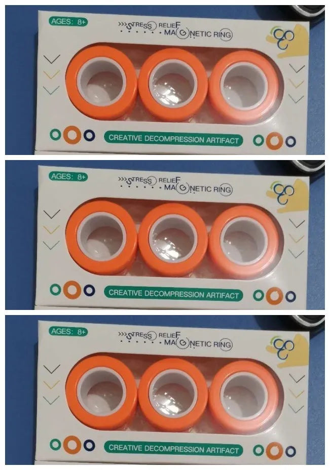 Plastic magnetic finger rotating ring spinner toy shown in multiple colours on a finger.
