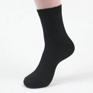 Men's bamboo fibre crew sock with small square pattern in black, navy, grey, and grey-blue colours.
