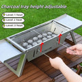 Small portable charcoal barbecue with foldable legs in a compact, folded position