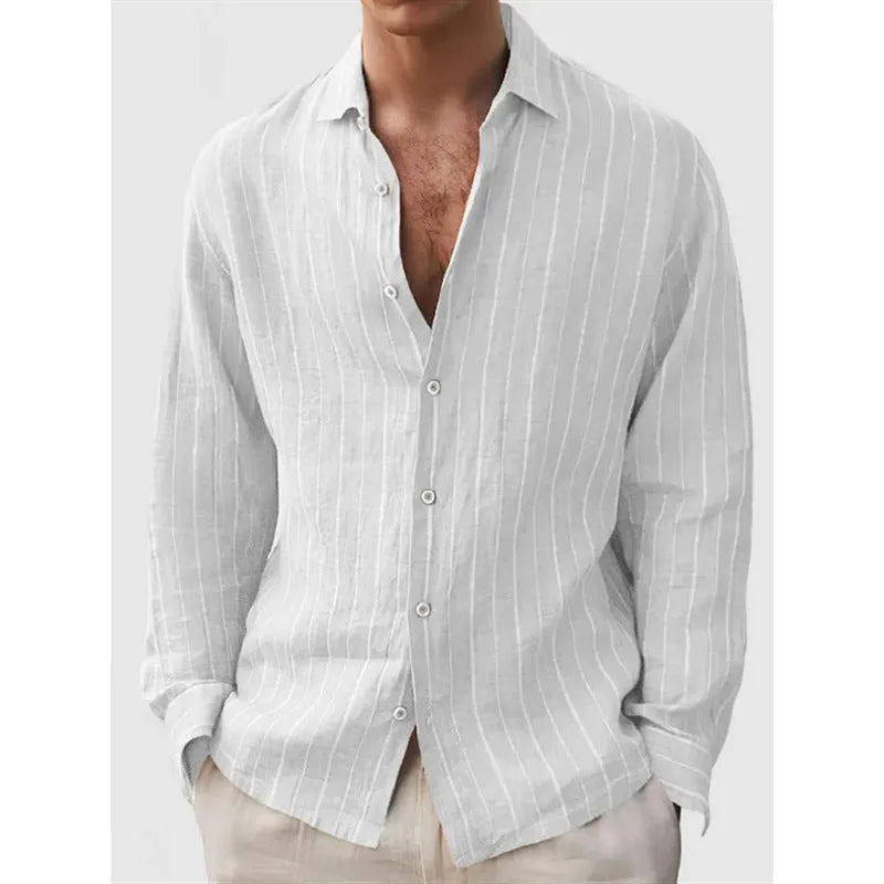 Man wearing a loose-fit striped long sleeve cardigan-style shirt in a casual setting.