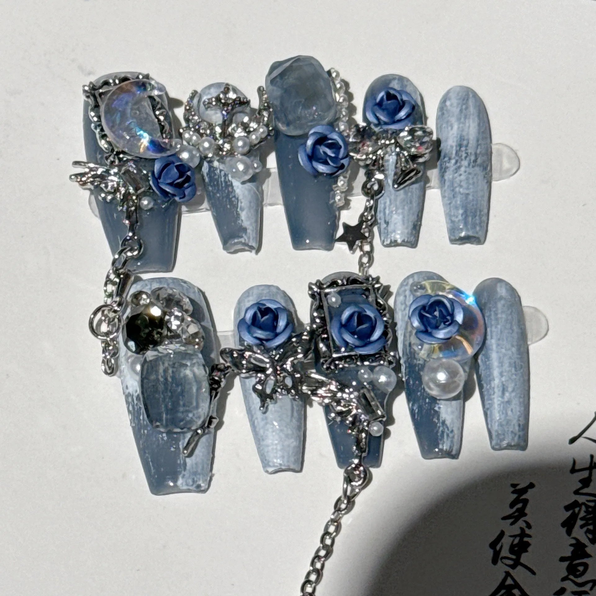 Blue night manicure set with rose and tulip patterns for ladies in four sizes