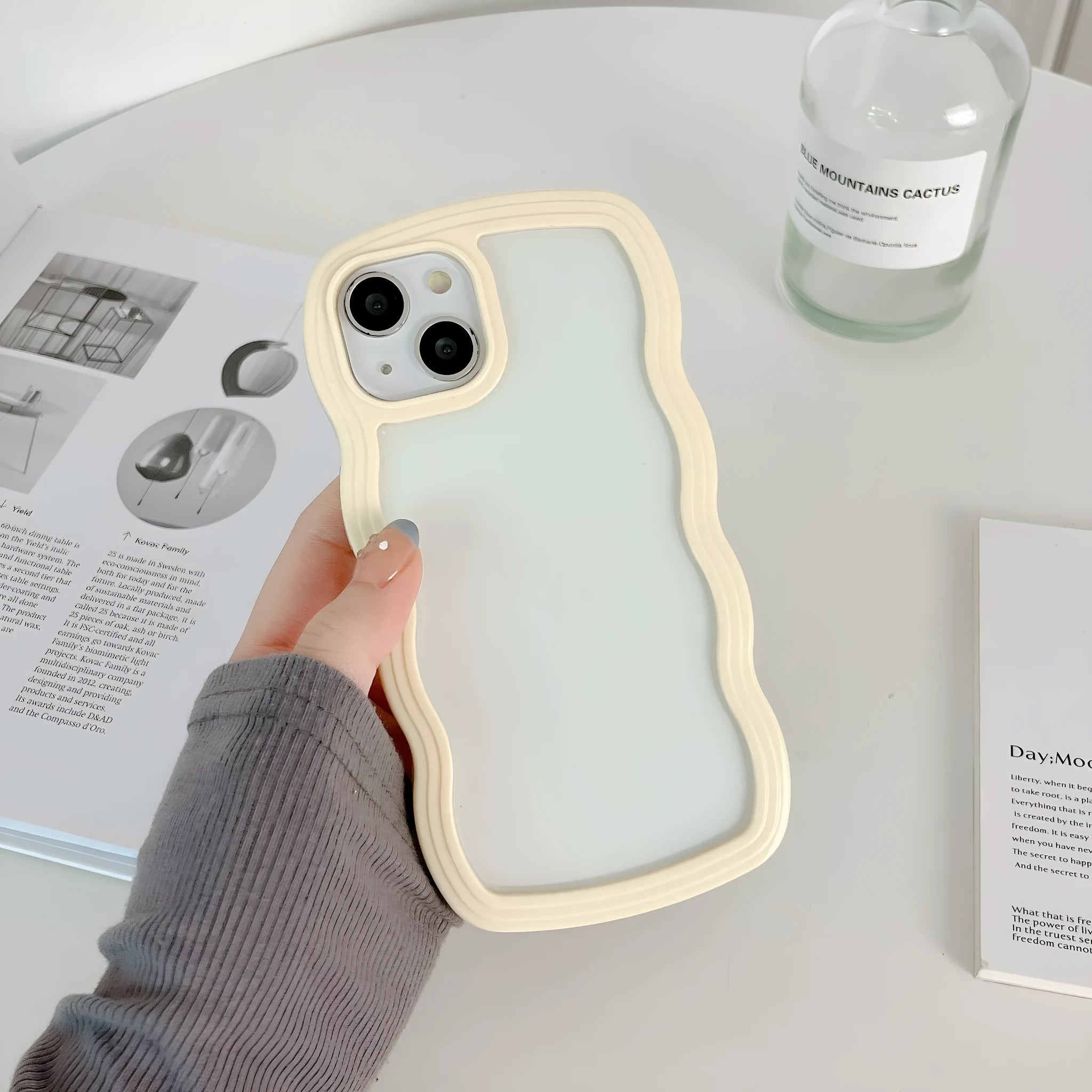 Light yellow TPU phone case with wave border for iPhone 16 series models