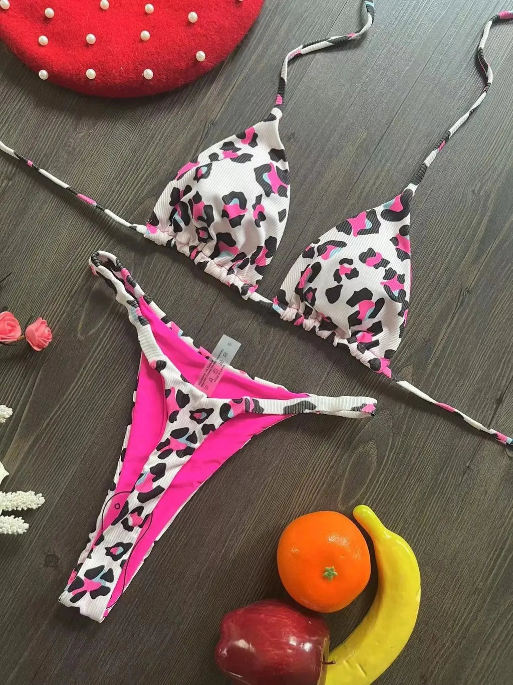 Women's printed bikini swimsuit with quick-dry fabric shown in available colours