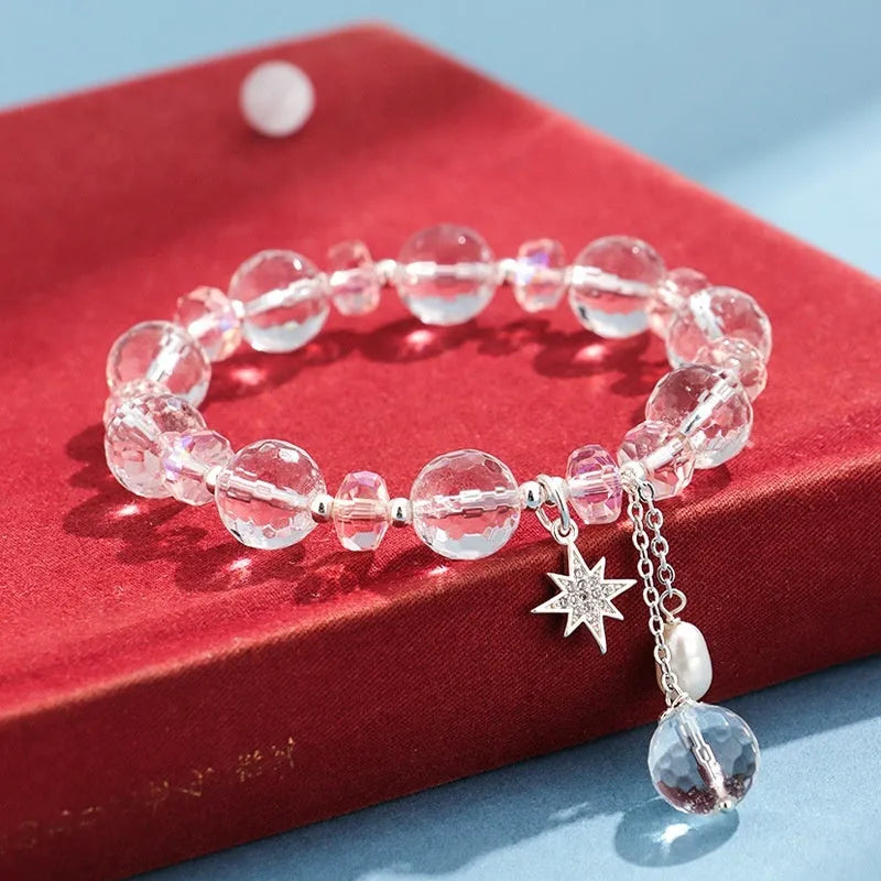 Women's white crystal bracelet with lucky cat charm and diamond design elements