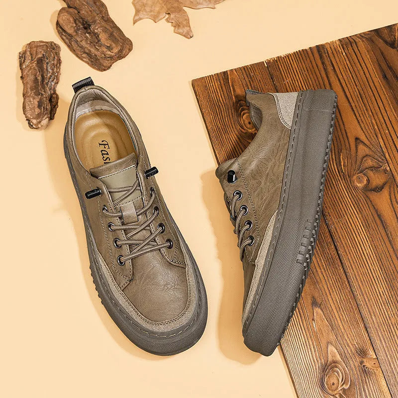 Men's black round toe leather casual shoes with microfiber uppers and rubber soles shown from side view