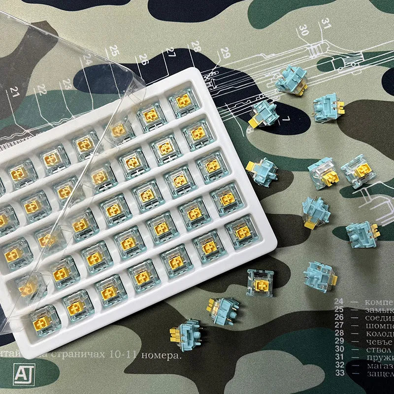 36 pale lemon-yellow Tiger Mo Sea Salt Lemon PRO Mute mechanical keyboard switches laid out.