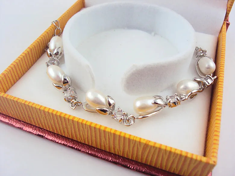 Freshwater pearl bracelet with Korean crown design alloy closure on display