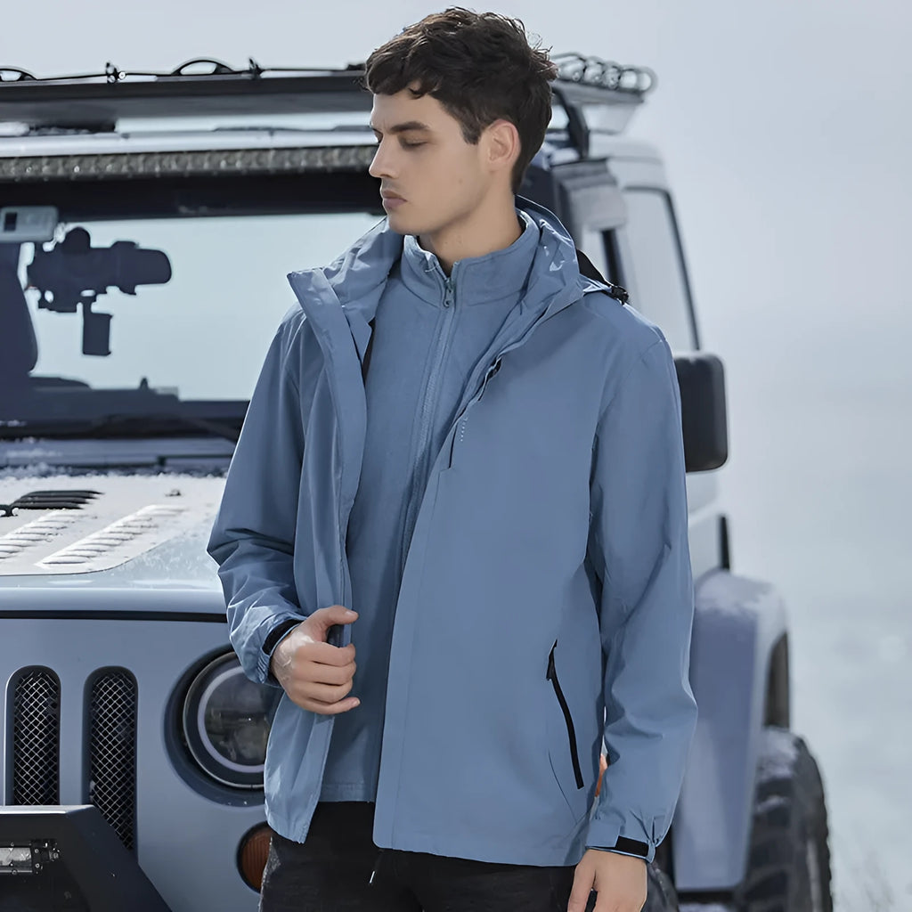 Men's black waterproof mountaineering jacket and trouser set with removable fleece lining