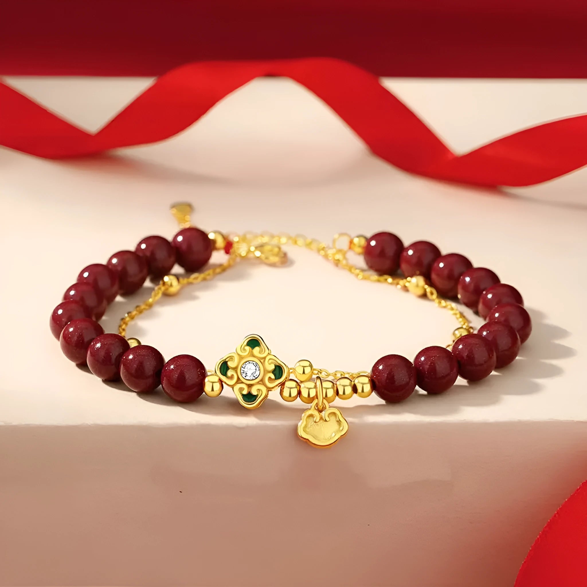 Sterling silver women's bracelet with Ruyi and Xiangyun motifs and cinnabar flower details