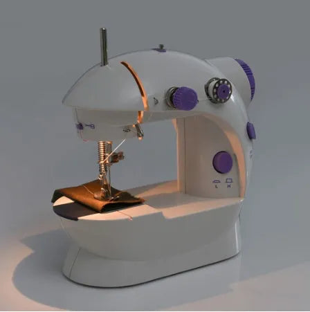 Miniature white and grey electric household sewing machine with thread spool and power cord.