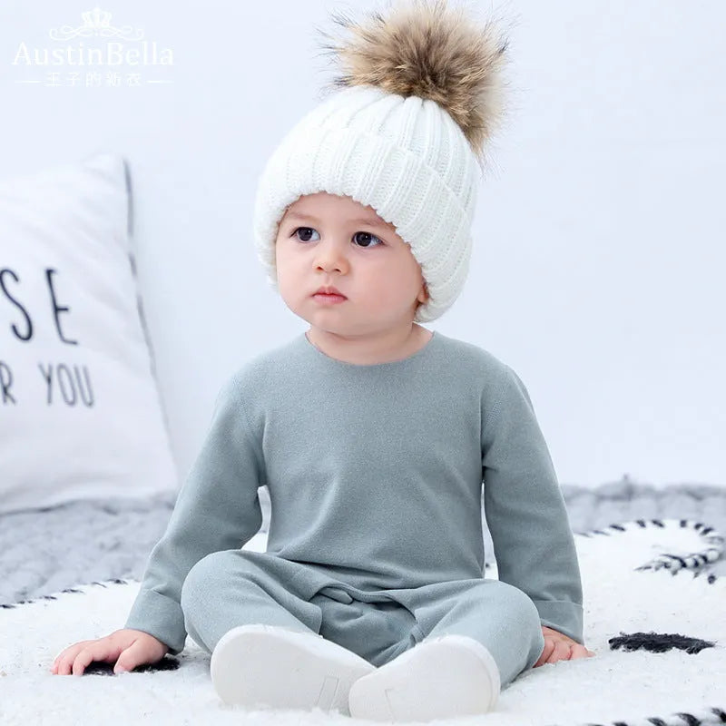 Baby pajama climbing suit in 100% polyester with blue colour, footed Siamese style, on white background