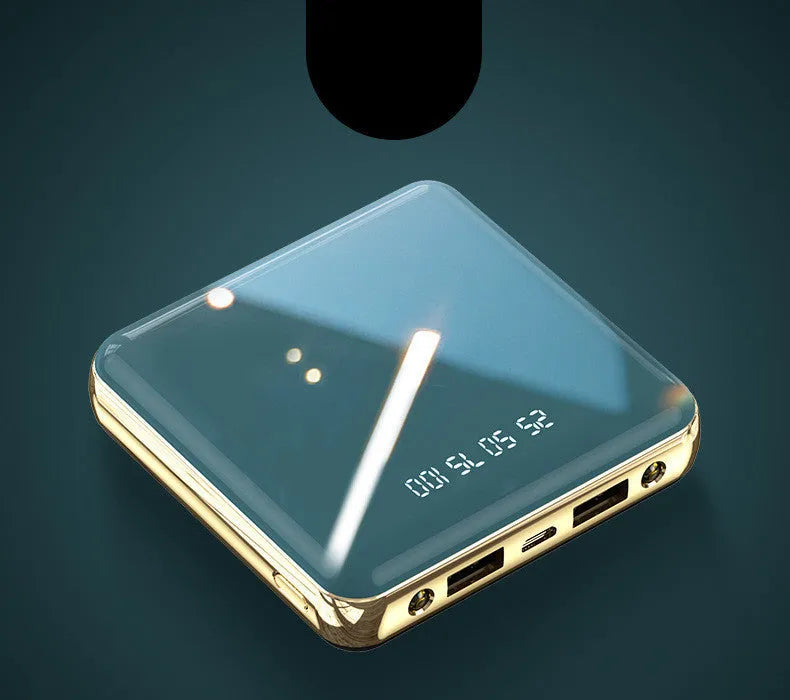 Compact mini 20000mAh power bank in blue with multiple USB ports and aluminium shell.