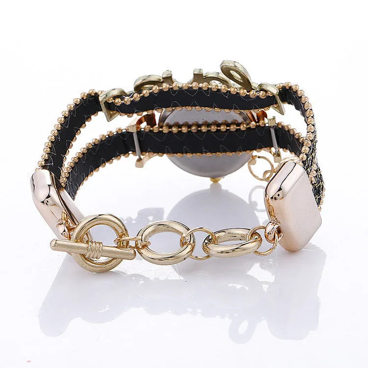Sequin bracelet watch with round 25mm dial, alloy case and faux leather strap in black