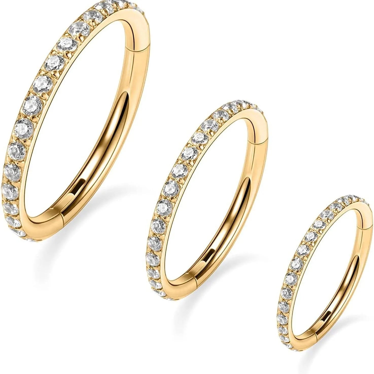 A stainless steel seamless nose ring with a diamond setting, shown in gold, rose gold, black, and steel finishes.