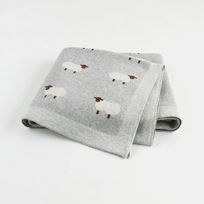Grey and pink 100x80 cm cotton baby sheepskin blanket laid flat, suitable as a pram or cot cover.