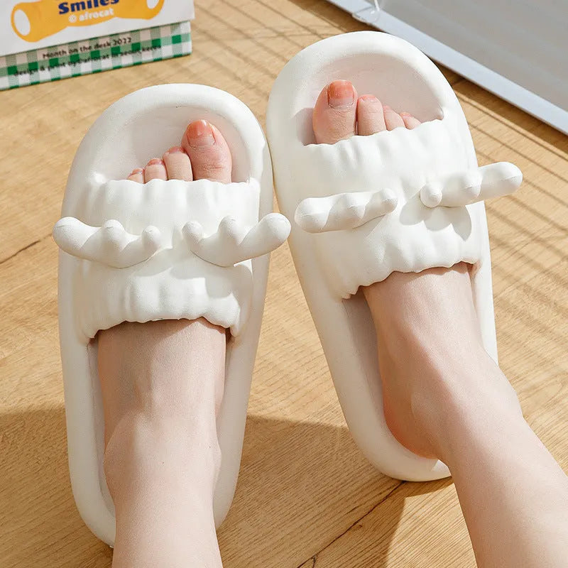 Women's EVA flip flop slippers with deer horn design and non-slip sole in light yellow.