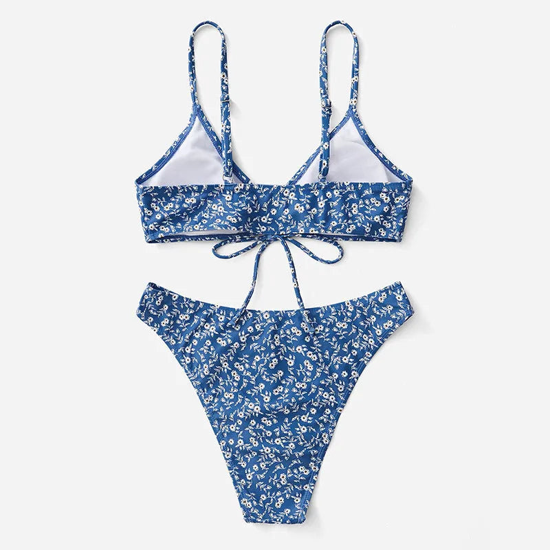 Blue women's polyester swimsuit three-piece set showing top and shorts, no steel rings.
