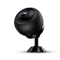 A white 1080p wireless Wi‑Fi security camera for indoor surveillance on a table.