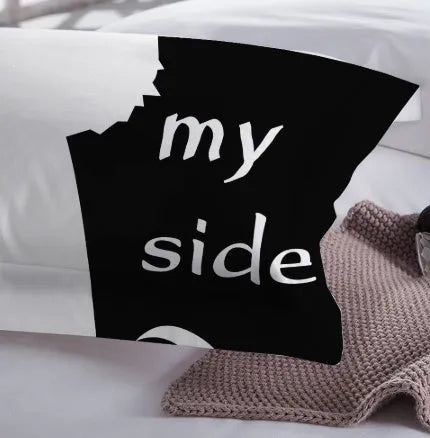 Three-piece quilted polyester bedding set in flower colour with geometric pattern on a bed