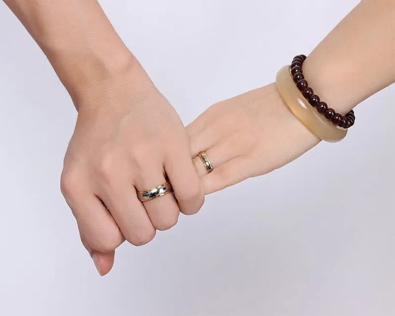 Tungsten steel couple gold ring in male and female styles for engagement or fashion wear