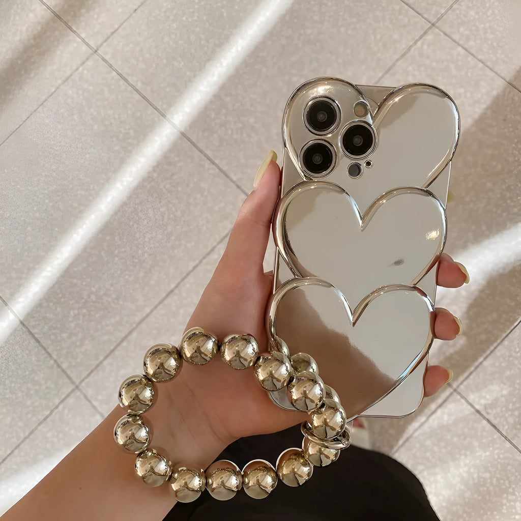 Electroplating love design on a soft TPU iPhone mobile phone case, shown next to a matching bracelet.