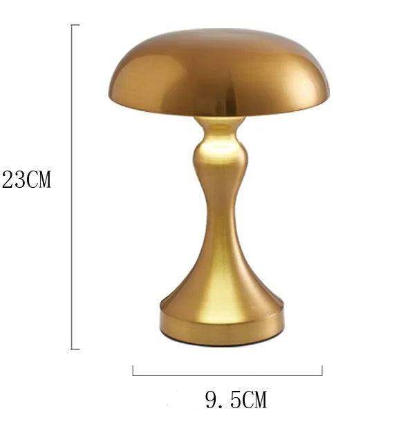Metallic USB rechargeable LED desk lamp with touch control in bronze, gold, or silver finish.