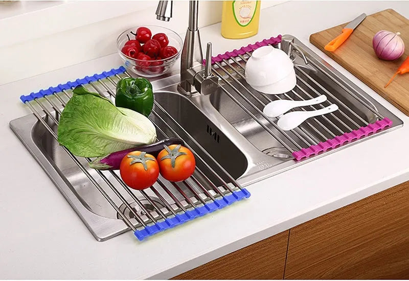 Foldable stainless steel kitchen sink drying rack shown in blue, red, and green colour options
