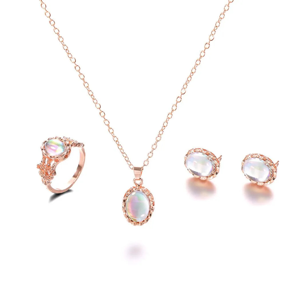Women's pendant necklace set in alloy with electroplating and inlaid artificial gems, supplied with earrings and hand accessories.