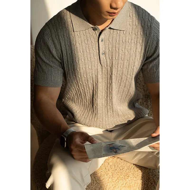Man wearing a khaki short-sleeve business casual top, showing slim fit and fabric texture.