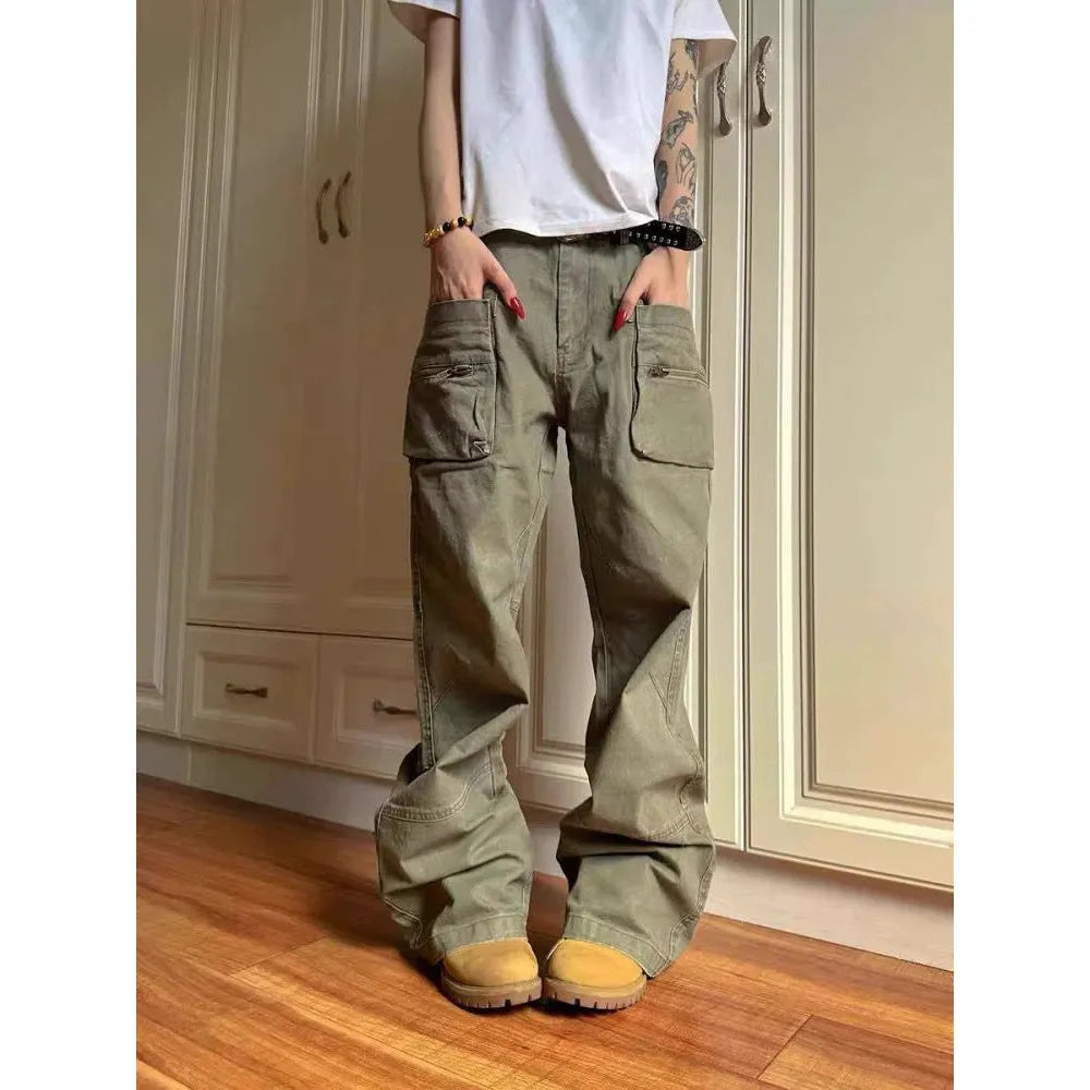 Green double zip cotton casual workwear trousers with a pocket, shown in a mid-waist fit.