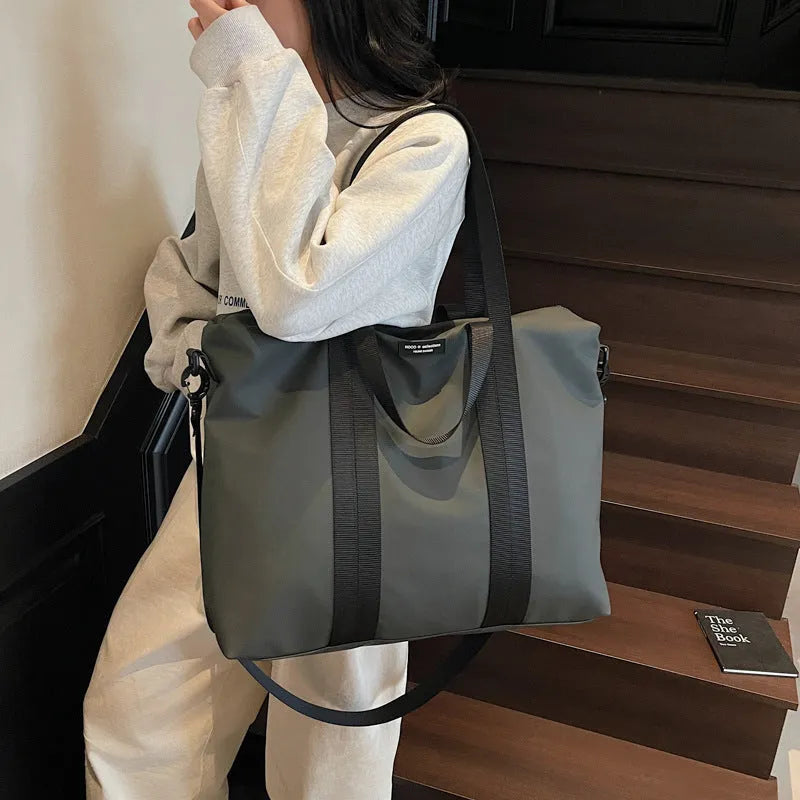 Lightweight Oxford cloth travel tote bag in black, grey, or champagne colour
