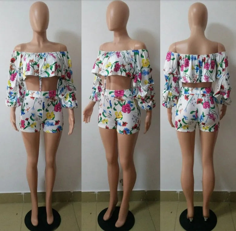 Multicolour digital print women's two-piece outfit with pile sleeve top and matching shorts.