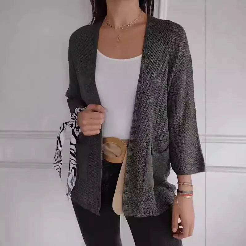 Women's waffle-textured cardigan coat with nine-quarter length sleeves in Army Green.