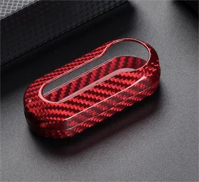 Carbon fibre and glass fibre replacement shell for a car key fob in Black, Red, and Silver Black colour options.