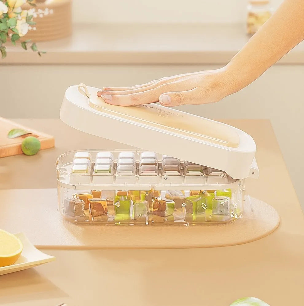 High capacity ice cube tray and storage box set in blue with integrated shovel storage.