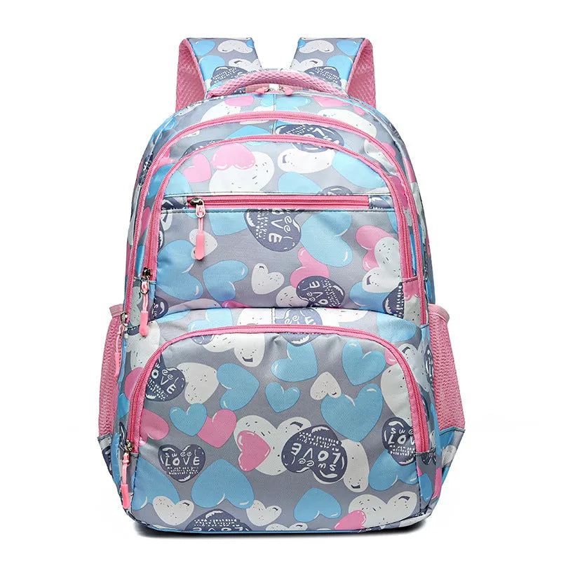 Blue children's large capacity Oxford cloth school backpack with air pillow shoulder straps.