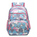 Blue children's large capacity Oxford cloth school backpack with air pillow shoulder straps.