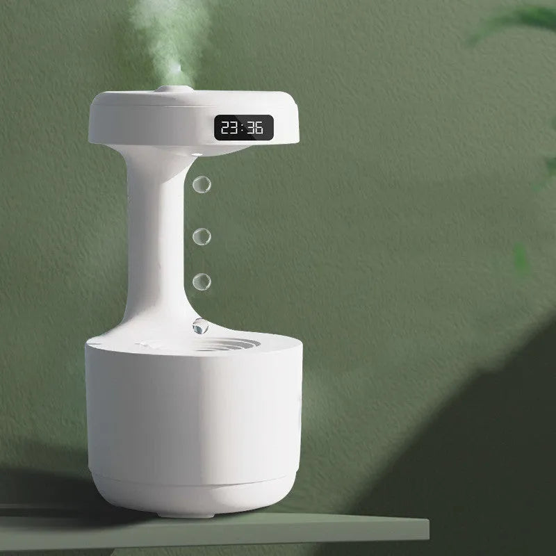 White columnar anti-gravity humidifier with LED clock display and water droplet backflow feature