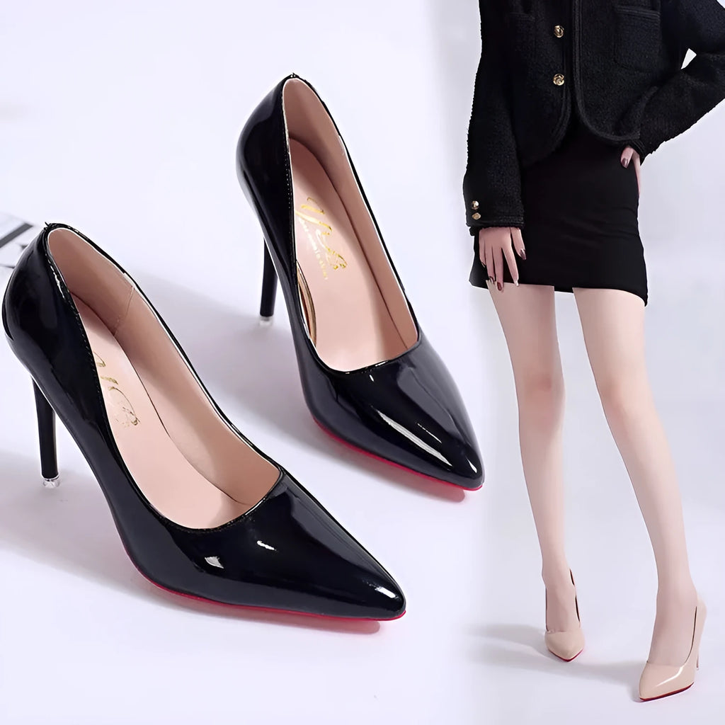 Women's black stiletto pumps with pointed toe and shallow mouth design on white background