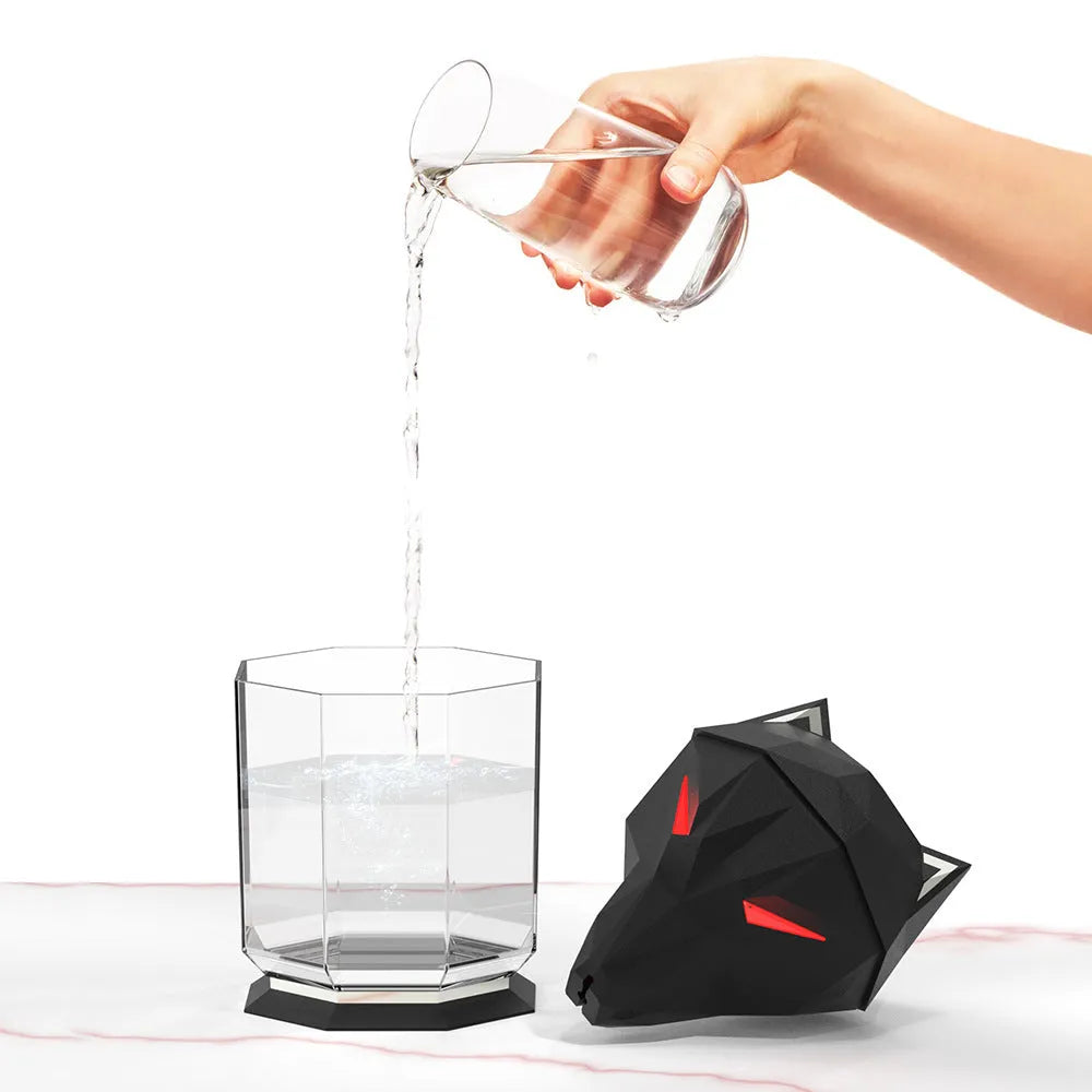 Black and white desktop humidifier with colourful lights and USB cable