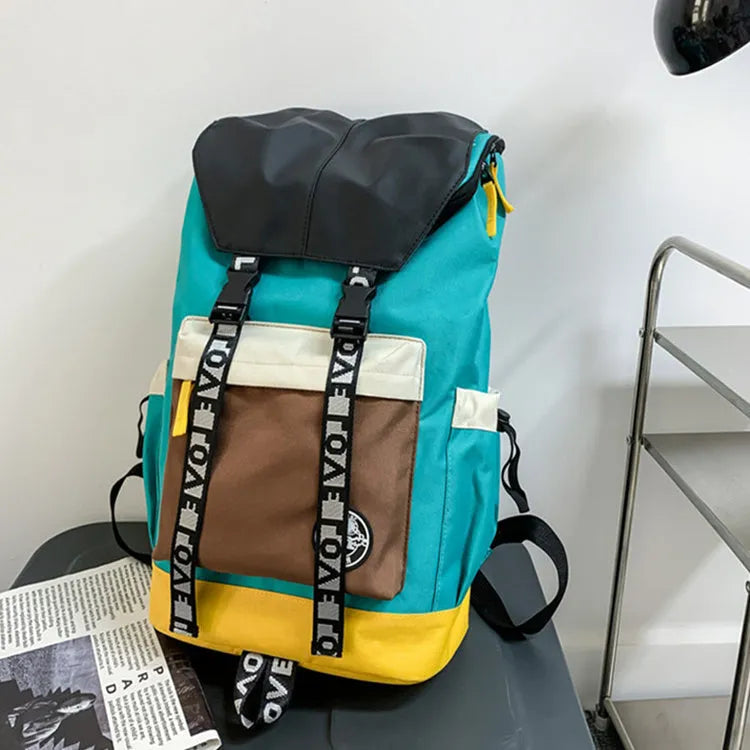 Oxford cloth backpack in black, green, or red colours showing handheld and shoulder straps.