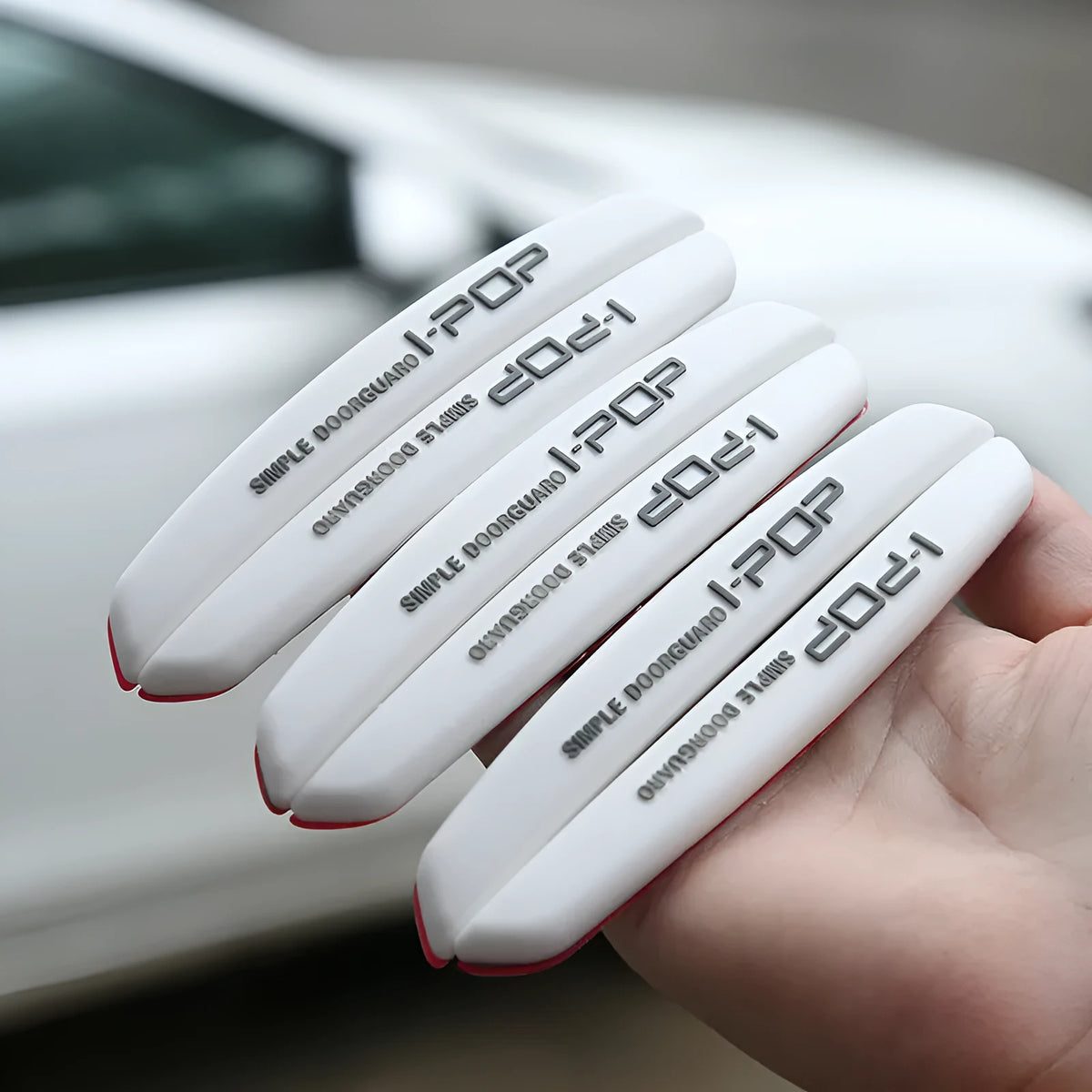 Set of six wedge-shaped PVC door anti-collision strips in various colours for car doors and mirrors