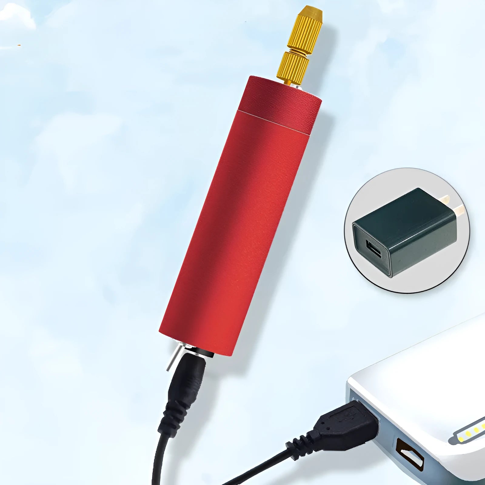 Micro aluminium USB electric grinder with three drill bits on a wooden table